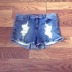 Ripped jeans shorts, slightly high waisted,